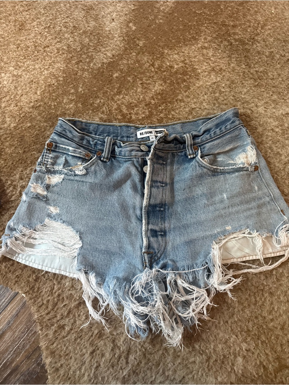 Re/Done Faded Light Blue Distressed Denim Cutoff Shorts